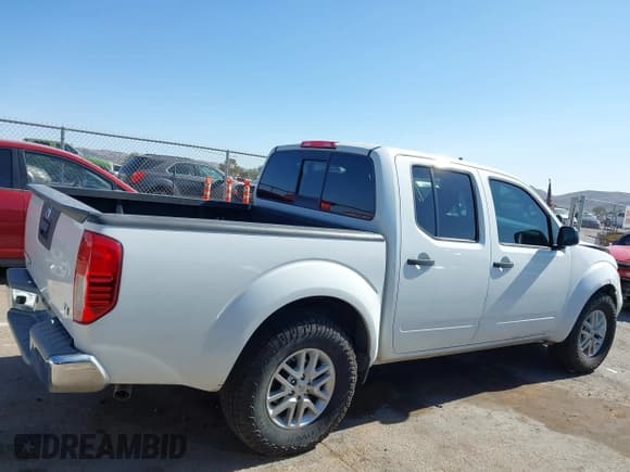 ✅ 2016 Nissan Frontier SV • VIN: 1N6AD0ER3GN738949 • Lot: 42106172. Listed on IAAI with 123,023 mi. Free auction sales archive from the USA and detailed vehicle history report at DreamBid. Image 13.