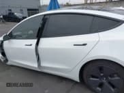 ✅ 2023 Tesla Model 3 • VIN: 5YJ3E1EAXPF551800 • Lot: 43227102. Listed on IAAI with 23,587 mi. Free auction sales archive from the USA and detailed vehicle history report at DreamBid. Image 14.