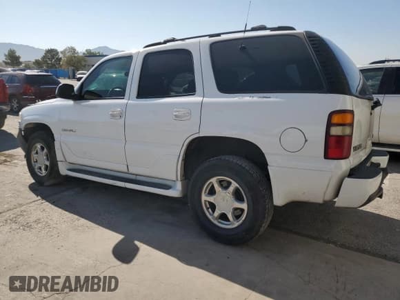 ✅ 2001 GMC Yukon Denali • VIN: 1GKEK63U61J186208 • Lot: 70895394. Listed on Copart with 207,395 mi. Free auction sales archive from the USA and detailed vehicle history report at DreamBid. Image 2.