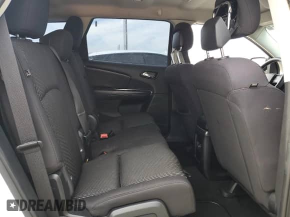 2013 Dodge Journey American Value with VIN 3C4PDCAB0DT575812, listed as a Copart auction lot 86771425 with 113,450 mi miles and Salvage title. Bid and sale history available at DreamBid. Image 10.