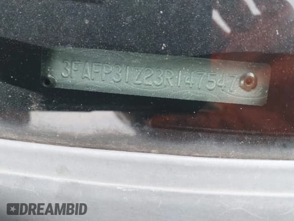 ✅ 2003 Ford Focus ZX3 • VIN: 3FAFP31Z23R147547 • Lot: 42426117. Listed on IAAI with 129,860 mi. Free auction sales archive from the USA and detailed vehicle history report at DreamBid. Image 9.