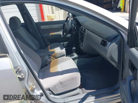 ✅ 2007 Suzuki Forenza • VIN: KL5JD56Z37K545965 • Lot: 42126552. Wystawiony na IAAI z przebiegiem 55 660 mil. Bezpłatny archiwum sprzedaży aukcyjnych z USA i szczegółowy raport historii pojazdu na DreamBid. Zdjęcie 5.