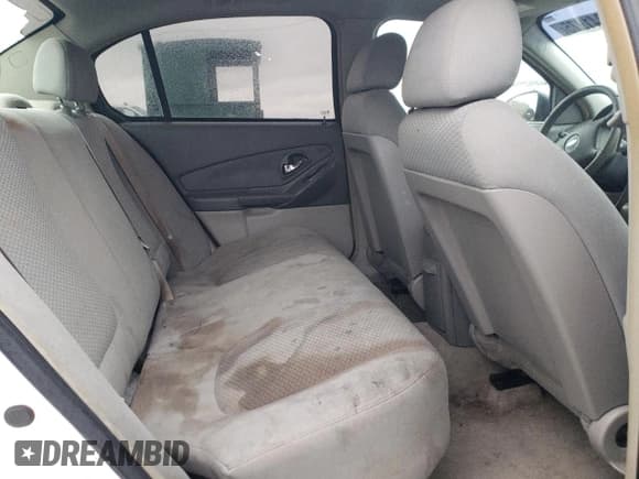 ✅ 2007 Chevrolet Malibu LS • VIN: 1G1ZS58N47F301420 • Lot: 90241975. Listed on Copart with 214,219 mi. Free auction sales archive from the USA and detailed vehicle history report at DreamBid. Image 10.