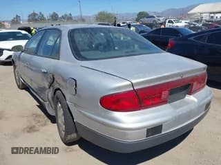 ✅ 2002 Buick Regal LS • VIN: 2G4WB55K721178647 • Lot: 43150940. Wystawiony na IAAI z przebiegiem 150 141 mil. Bezpłatny archiwum sprzedaży aukcyjnych z USA i szczegółowy raport historii pojazdu na DreamBid. Zdjęcie 3.