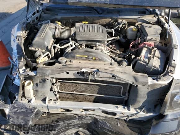 2007 Dodge Dakota SLT z VIN 1D7HW48N97S242802, wystawiony jako Copart lot #72783704 z przebiegiem 151 906 mil mil oraz Szkoda całkowita • Salvage title. Historia ofert i sprzedaży dostępna na DreamBid. Obrazek 11.