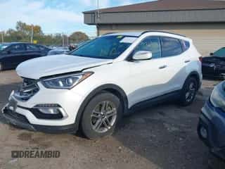 2018 Hyundai Santa Fe 2.4L z VIN 5NMZUDLB1JH097002, wystawiony jako IAAI lot #43473652 z przebiegiem 182 069 mil mil oraz . Historia ofert i sprzedaży dostępna na DreamBid. Obrazek 2.