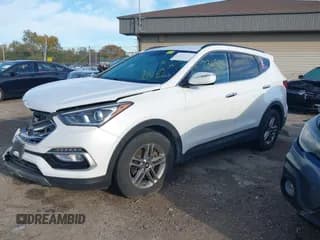 ✅ 2018 Hyundai Santa Fe 2.4L • VIN: 5NMZUDLB1JH097002 • Лот: 43473652. Опубликован ранее на IAAI с пробегом 182 069 миль. Бесплатный доступ к архиву аукционных продаж из США и подробный отчёт об истории автомобиля на DreamBid. Изображение 2.