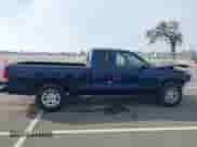 2004 Dodge Dakota Sport z VIN 1D7GL32NX4S690551, wystawiony jako IAAI lot #41421933 z przebiegiem 94 638 mil mil oraz . Historia ofert i sprzedaży dostępna na DreamBid. Obrazek 13.