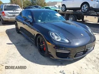 ✅ 2014 Porsche Panamera GTS • VIN: WP0AF2A7XEL083453 • Lot: 41735250. Listed on IAAI with 57,695 mi. Free auction sales archive from the USA and detailed vehicle history report at DreamBid. Image 1.