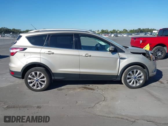 ✅ 2017 Ford Escape Titanium • VIN: 1FMCU0JD6HUD58495 • Lot: 43617499. Wystawiony na IAAI z przebiegiem 118 379 mil. Bezpłatny archiwum sprzedaży aukcyjnych z USA i szczegółowy raport historii pojazdu na DreamBid. Zdjęcie 13.