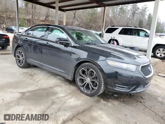 ✅ 2014 Ford Taurus SHO • VIN: 1FAHP2KT2EG107878 • Lot: 44894075. Listed on Copart with 103,472 mi. Free auction sales archive from the USA and detailed vehicle history report at DreamBid. Image 4.