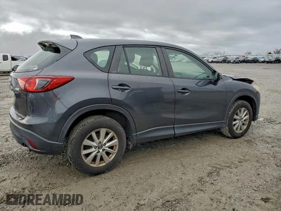 ✅ 2015 Mazda CX-5 Sport • VIN: JM3KE2BE0F0502750 • Lot: 93753425. Listed on Copart with 101,312 mi. Free auction sales archive from the USA and detailed vehicle history report at DreamBid. Image 3.