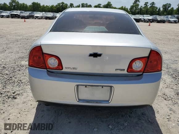 2010 Chevrolet Malibu 1FL z VIN 1G1ZA5E0XAF107140, wystawiony jako Copart lot #61450434 z przebiegiem 147 301 mil mil oraz Szkoda całkowita • Salvage title. Historia ofert i sprzedaży dostępna na DreamBid. Obrazek 6.