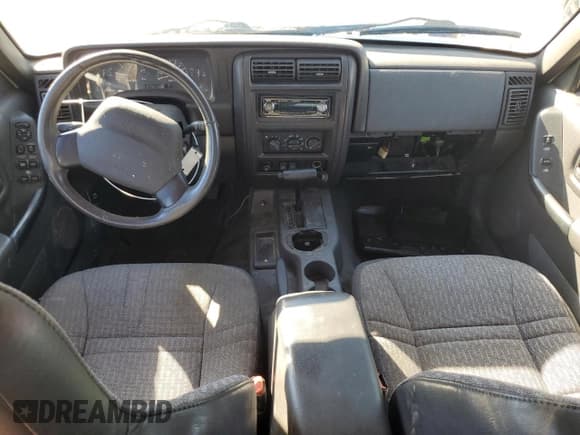 ✅ 2001 Jeep Cherokee Sport • VIN: 1J4FT48S61L576779 • Lot: 86999455. Listed on Copart with 245,218 mi. Free auction sales archive from the USA and detailed vehicle history report at DreamBid. Image 8.