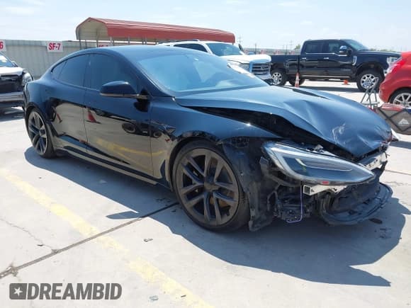 ✅ 2021 Tesla Model S Plaid • VIN: 5YJSA1E65MF439632 • Lot: 43166263. Listed on IAAI with 38,565 mi. Free auction sales archive from the USA and detailed vehicle history report at DreamBid. Image 1.