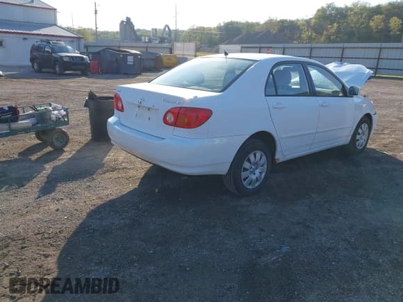 ✅ 2004 Toyota Corolla CE • VIN: 1NXBR32EX4Z326293 • Lot: 43435659. Listed on IAAI with 299,999 mi. Free auction sales archive from the USA and detailed vehicle history report at DreamBid. Image 4.