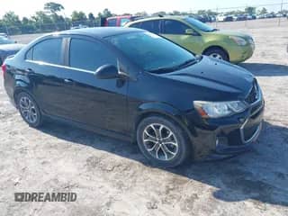 2018 Chevrolet Sonic LT z VIN 1G1JD5SH2J4111631, wystawiony jako IAAI lot #42873623 z przebiegiem 106 612 mil mil oraz . Historia ofert i sprzedaży dostępna na DreamBid. Obrazek 1.