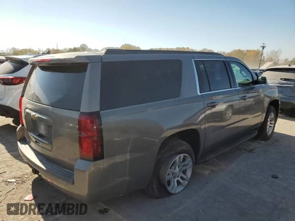 2018 Chevrolet Suburban LS z VIN 1GNSKGEC8JR390719, wystawiony jako Copart lot #77217534 z przebiegiem 83 356 mil mil oraz Szkoda całkowita • Salvage title. Historia ofert i sprzedaży dostępna na DreamBid. Obrazek 3.
