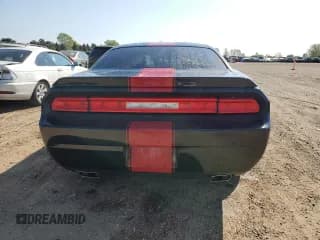 ✅ 2013 Dodge Challenger SXT • VIN: 2C3CDYAG6DH511424 • Lot: 71311754. Wystawiony na Copart z przebiegiem 74 952 mil. Bezpłatny archiwum sprzedaży aukcyjnych z USA i szczegółowy raport historii pojazdu na DreamBid. Zdjęcie 6.