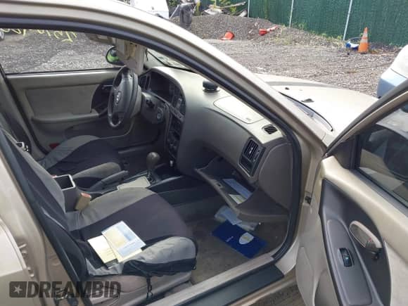 2005 Hyundai Elantra GLS z VIN KMHDN46D85U123335, wystawiony jako IAAI lot #43254224 z przebiegiem Nie podano mil oraz . Historia ofert i sprzedaży dostępna na DreamBid. Obrazek 5.