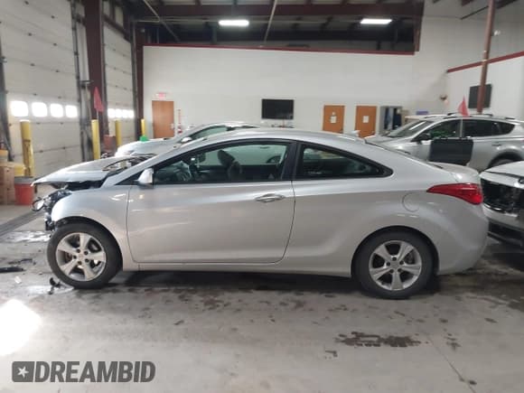 ✅ 2013 Hyundai Elantra GS • VIN: KMHDH6AE6DU005981 • Lot: 41560050. Listed on IAAI with Not provided. Free auction sales archive from the USA and detailed vehicle history report at DreamBid. Image 14.