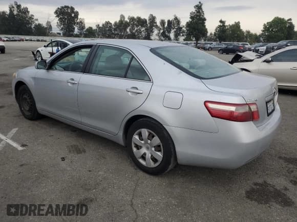 ✅ 2007 Toyota Camry CE • VIN: 4T1BE46K27U642969 • Lot: 93036635. Wystawiony na Copart z przebiegiem 209 968 mil. Bezpłatny archiwum sprzedaży aukcyjnych z USA i szczegółowy raport historii pojazdu na DreamBid. Zdjęcie 2.