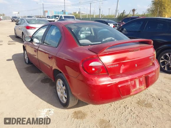 ✅ 2005 Dodge Neon SXT • VIN: 1B3ES56C45D145056 • Lot: 43917053. Listed on IAAI with 112,039 mi. Free auction sales archive from the USA and detailed vehicle history report at DreamBid. Image 3.