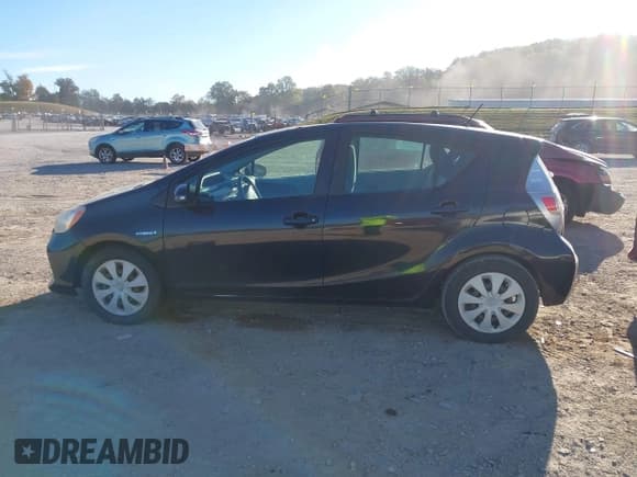✅ 2013 Toyota Prius One • VIN: JTDKDTB32D1546286 • Lot: 43487780. Listed on IAAI with 126,825 mi. Free auction sales archive from the USA and detailed vehicle history report at DreamBid. Image 14.