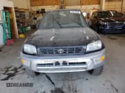 ✅ 2000 Toyota RAV4 • VIN: JT3HP10V4Y0232794 • Lot: 84278185. Listed on Copart with 243,884 mi. Free auction sales archive from the USA and detailed vehicle history report at DreamBid. Image 5.