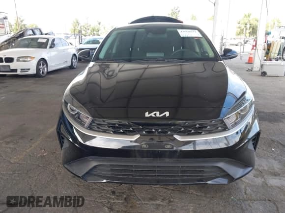 ✅ 2023 Kia Forte LXS • VIN: 3KPF24AD8PE607486 • Lot: 43666572. Listed on IAAI with 31,311 mi. Free auction sales archive from the USA and detailed vehicle history report at DreamBid. Image 13.