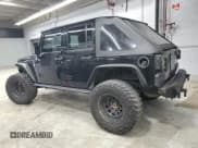 ✅ 2016 Jeep Wrangler Unlimited Sport • VIN: 1C4BJWDG5GL107747 • Lot: 91500465. Listed on Copart with 116,864 mi. Free auction sales archive from the USA and detailed vehicle history report at DreamBid. Image 2.