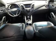 ✅ 2013 Hyundai Veloster Turbo • VIN: KMHTC6AE1DU167026 • Lot: 65680604. Wystawiony na Copart z przebiegiem 77 428 mil. Bezpłatny archiwum sprzedaży aukcyjnych z USA i szczegółowy raport historii pojazdu na DreamBid. Zdjęcie 8.