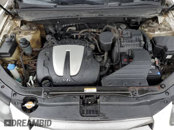 2012 Hyundai Santa Fe GLS z VIN 5XYZGDAG3CG166338, wystawiony jako Copart lot #73139004 z przebiegiem 124 377 mil mil oraz Czysty tytuł • Clean title. Historia ofert i sprzedaży dostępna na DreamBid. Obrazek 11.