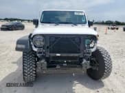 ✅ 2022 Jeep Wrangler Sport S • VIN: 1C4GJXAG5NW259605 • Lot: 57659775. Listed on Copart with 14,864 mi. Free auction sales archive from the USA and detailed vehicle history report at DreamBid. Image 5.