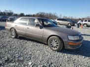 ✅ 1993 Lexus LS • VIN: JT8UF11E3P0155716 • Лот: 83273374. Опубликован ранее на Copart с пробегом 352 180 миль. Бесплатный доступ к архиву аукционных продаж из США и подробный отчёт об истории автомобиля на DreamBid. Изображение 4.