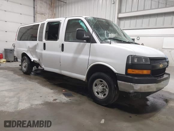 ✅ 2023 Chevrolet Express Passenger LS • VIN: 1GAZGNFP8P1119268 • Lot: 42041945. Listed on IAAI with 23,123 mi. Free auction sales archive from the USA and detailed vehicle history report at DreamBid. Image 1.