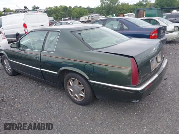 ✅ 2001 Cadillac Eldorado ESC • VIN: 1G6EL12Y01B107760 • Lot: 42797121. Wystawiony na IAAI z przebiegiem 86 446 mil. Bezpłatny archiwum sprzedaży aukcyjnych z USA i szczegółowy raport historii pojazdu na DreamBid. Zdjęcie 3.