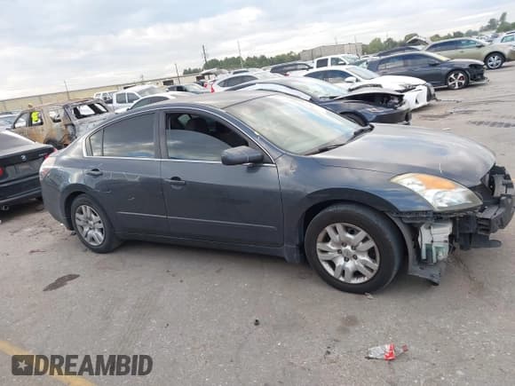 ✅ 2009 Nissan Altima S • VIN: 1N4AL21E99N464024 • Лот: 43425195. Опубликован ранее на IAAI с пробегом 264 901 миль. Бесплатный доступ к архиву аукционных продаж из США и подробный отчёт об истории автомобиля на DreamBid. Изображение 14.