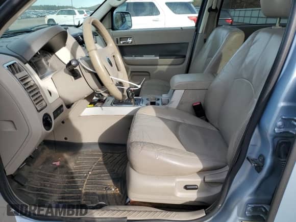 2009 Mercury Mariner Premier with VIN 4M2CU97719KJ17381, listed as a Copart auction lot 80750244 with 115,730 mi miles and Salvage title. Bid and sale history available at DreamBid. Image 7.