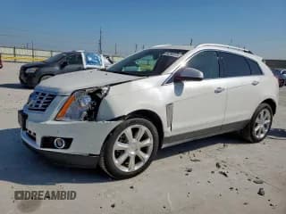 ✅ 2013 Cadillac SRX Premium Collection • VIN: 3GYFNJE37DS554987 • Lot: 84290375. Wystawiony na Copart z przebiegiem 151 131 mil. Bezpłatny archiwum sprzedaży aukcyjnych z USA i szczegółowy raport historii pojazdu na DreamBid. Zdjęcie 1.