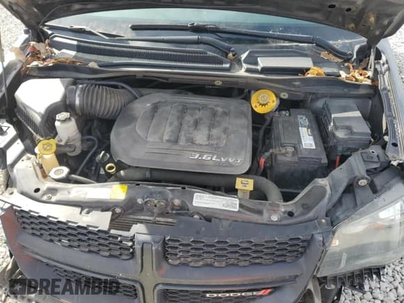 ✅ 2016 Dodge Grand Caravan SE • VIN: 2C4RDGBG4GR227402 • Lot: 82713295. Listed on Copart with 170,089 mi. Free auction sales archive from the USA and detailed vehicle history report at DreamBid. Image 12.