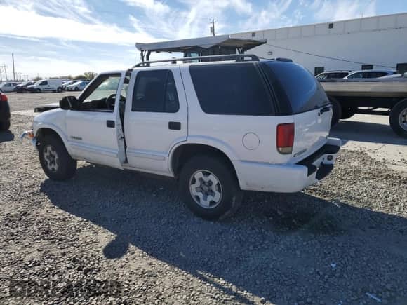 2004 Chevrolet Blazer LS with VIN 1GNDT13X34K148457, listed as a Copart auction lot 78950174 with 79,191 mi miles and Salvage title. Bid and sale history available at DreamBid. Image 2.