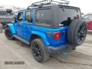 ✅ 2023 Jeep Wrangler Sahara • VIN: 1C4JJXP63PW579805 • Lot: 43401399. Listed on IAAI with 41,989 mi. Free auction sales archive from the USA and detailed vehicle history report at DreamBid. Image 3.