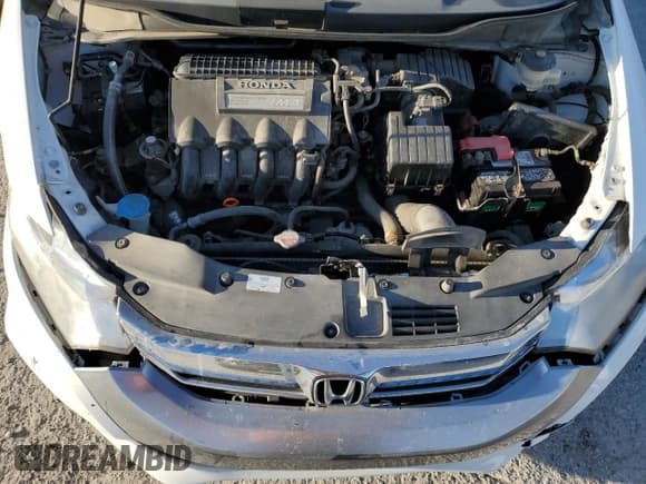 ✅ 2012 Honda Insight LX • VIN: JHMZE2H52CS001453 • Lot: 69799155. Listed on Copart with 103,901 mi. Free auction sales archive from the USA and detailed vehicle history report at DreamBid. Image 11.