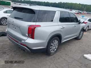 2023 Hyundai Palisade SEL z VIN KM8R24GE4PU614266, wystawiony jako IAAI lot #43102928 z przebiegiem 71 875 mil mil oraz . Historia ofert i sprzedaży dostępna na DreamBid. Obrazek 4.