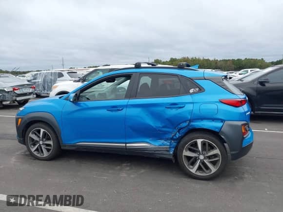 2020 Hyundai Kona Ultimate with VIN KM8K53A59LU532572, listed as a IAAI auction lot 43411407 with 66,092 mi miles and . Bid and sale history available at DreamBid. Image 14.