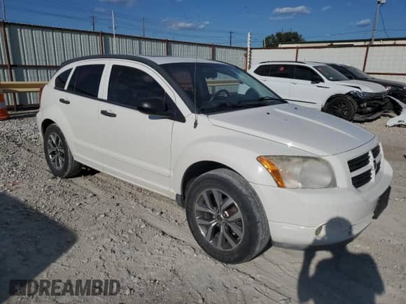 2008 Dodge Caliber SXT с VIN 1B3HB48B18D679860, выставлен на аукционе Copart как лот 71800004 с пробегом 165 882 миль миль и Списание • Salvage title. История ставок и продаж доступна на DreamBid. Изображение 4.
