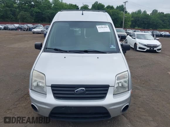 ✅ 2013 Ford Transit Connect XLT • VIN: NM0LS7DNXDT170521 • Lot: 42585450. Listed on IAAI with 80,084 mi. Free auction sales archive from the USA and detailed vehicle history report at DreamBid. Image 12.