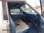 ✅ 1986 Nissan 720 • VIN: JN6ND01SXGX148116 • Lot: 42540372. Wystawiony na IAAI z przebiegiem 185 467 mil. Bezpłatny archiwum sprzedaży aukcyjnych z USA i szczegółowy raport historii pojazdu na DreamBid. Zdjęcie 5.