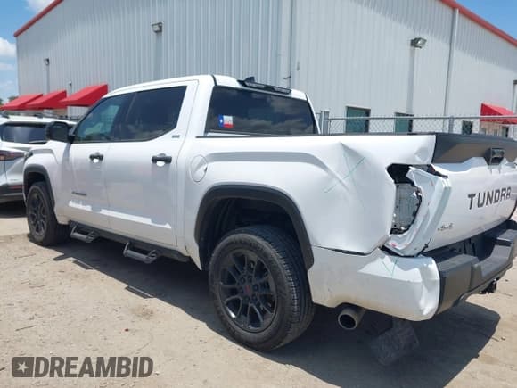 ✅ 2023 Toyota Tundra SR5 • VIN: 5TFLA5DB8PX060743 • Lot: 42702735. Listed on IAAI with 54,036 mi. Free auction sales archive from the USA and detailed vehicle history report at DreamBid. Image 3.